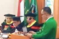 Iptu Abdillah Makmur, S. H., M.H. Saat pemamparan
disertasinya pada sidang terbuka Promosi Doktor Pasca Sarjana UMI di Makassar (11/8/26)