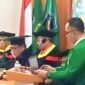 Iptu Abdillah Makmur, S. H., M.H. Saat pemamparan
disertasinya pada sidang terbuka Promosi Doktor Pasca Sarjana UMI di Makassar (11/8/26)